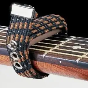 Dodaj do koszyka kapodaster JIM DUNLOP - RUSSEL ELASTIC HEAVY CAPO FLAT (7191)